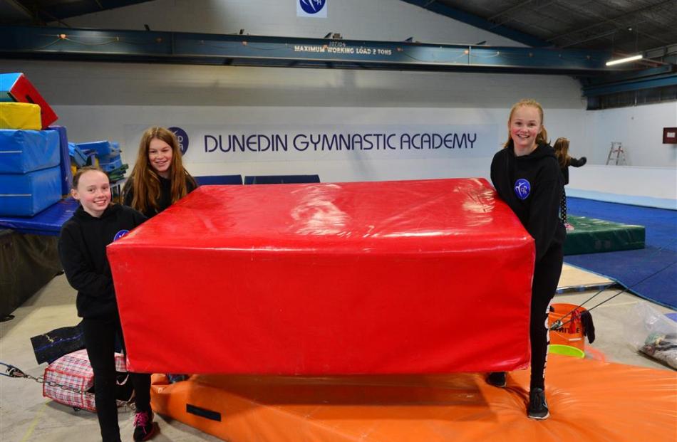 Dunedin Gymnastic Academy gymnasts (from left) Charlotte Hewson (12), Abby Stevens (15) and Ella...