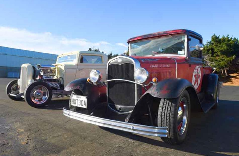 A 1930 Model A (foreground) and a 1932 Deuce Coupe.