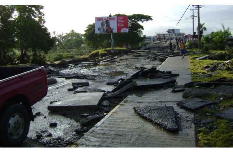 Flood damaged roads in Fiji's main commercial city of Nadi.