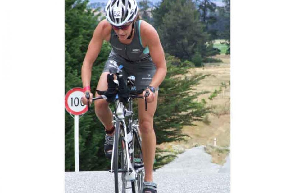 Merryn Johnstone fought to stay in touch with the leading cyclists in the Challenge Wanaka,...
