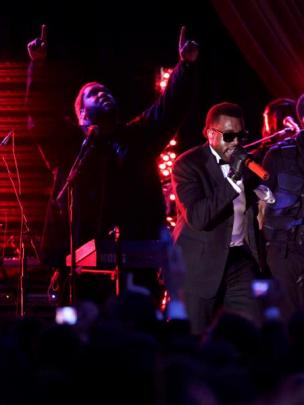Kanye West performs at the Youth Inaugural Ball at the Washington Hilton in Washington. Photo...