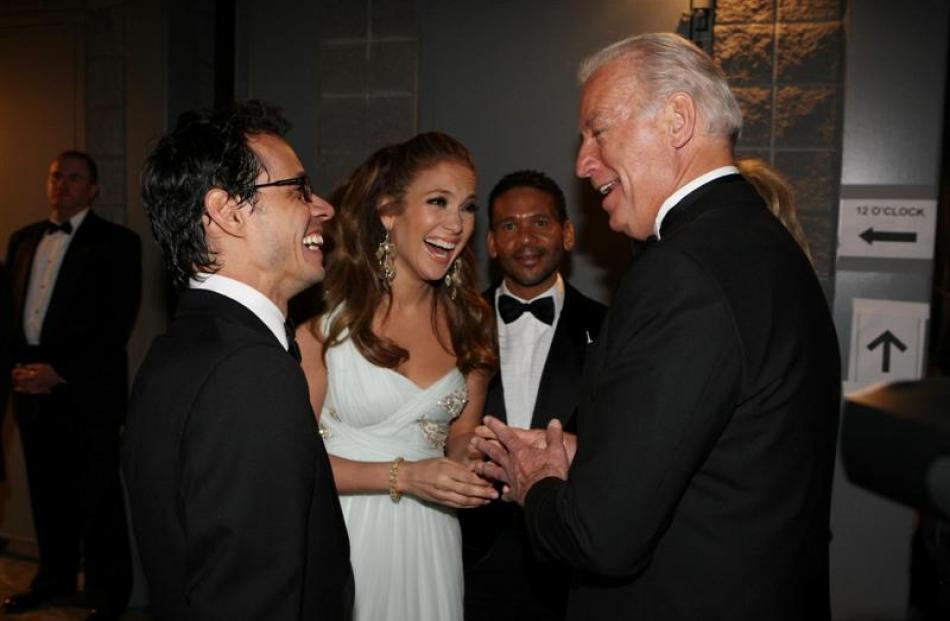 Vice President Joe Biden talks to Marc Anthony and Jennifer Lopez at the Mid Atlantic Ball in...