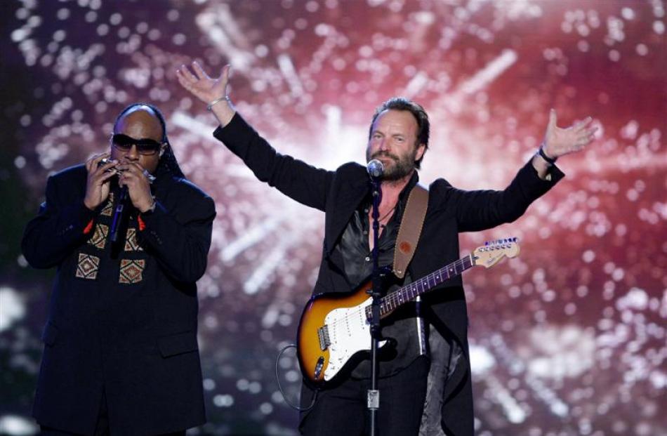 Stevie Wonder and Sting perform at the Neighborhood Inaugural Ball. Photo Alex Brandon/AP.