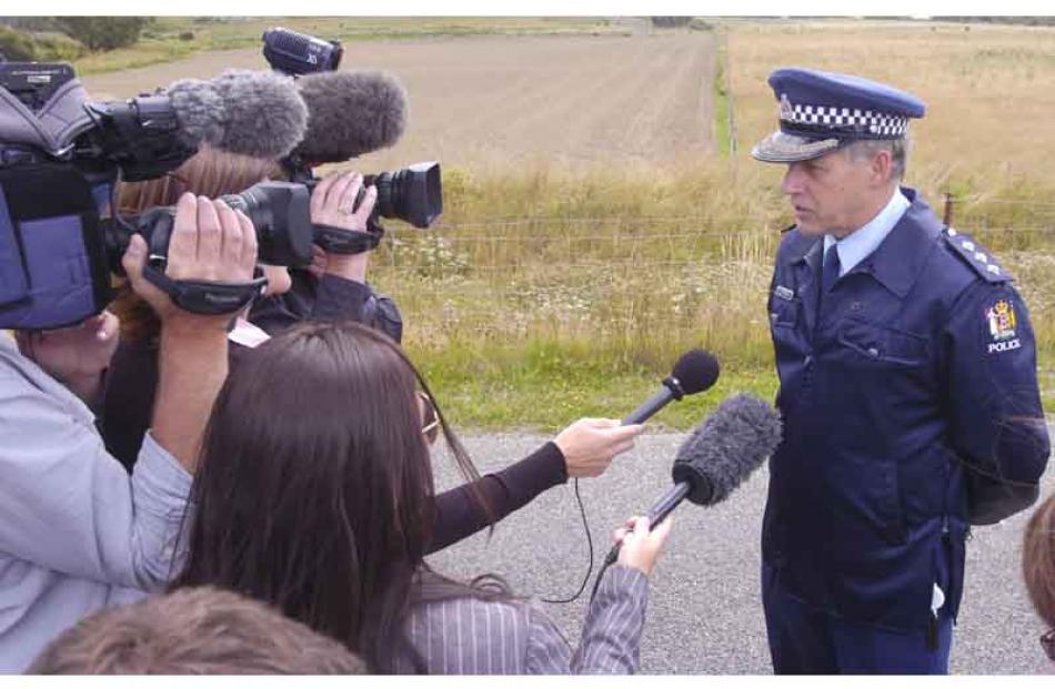 Inspector Dave Campbell speaks to media at Palmerston after a man was on the loose with a gun....