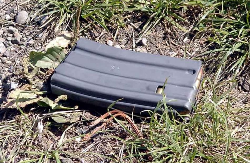 A magazine of live ammunition at the side of the road following an incident on Horse Range Road,...
