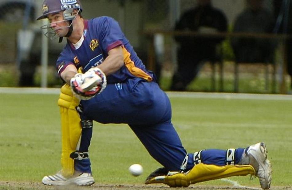 Otago's Sean Eathorne sweeps the ball.