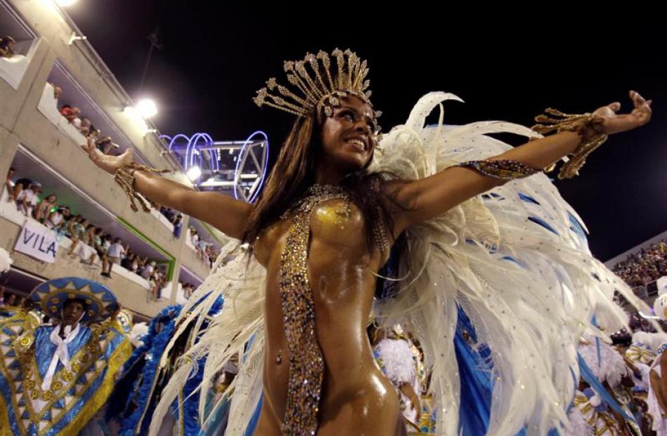 A dancer performs during the Vila Isabel samba school carnival parade at th...