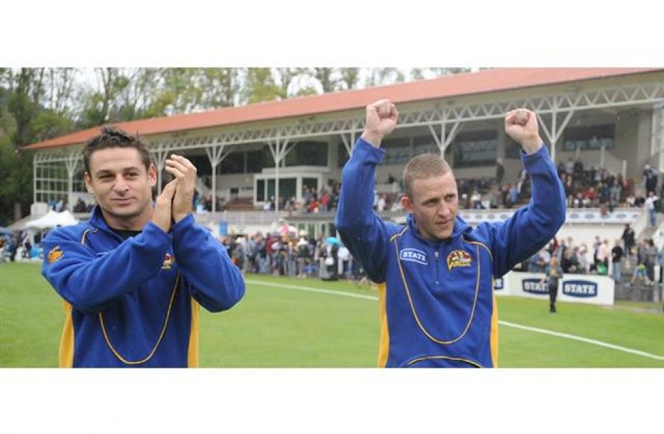 Otago Volts players Nathan McCullum (left) and Craig Cumming celebrate.