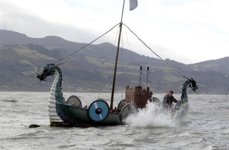 Tony Marcinowski makes a splash as he jumps overboard from a Viking long boat which broke anchor...