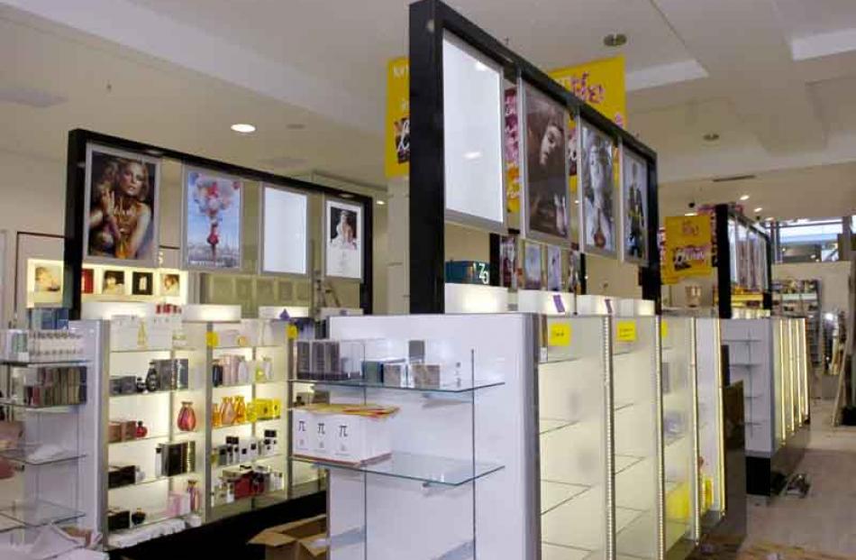 Shelves in Life Pharmacy almost ready for today's opening. Photo by Jane Dawber.