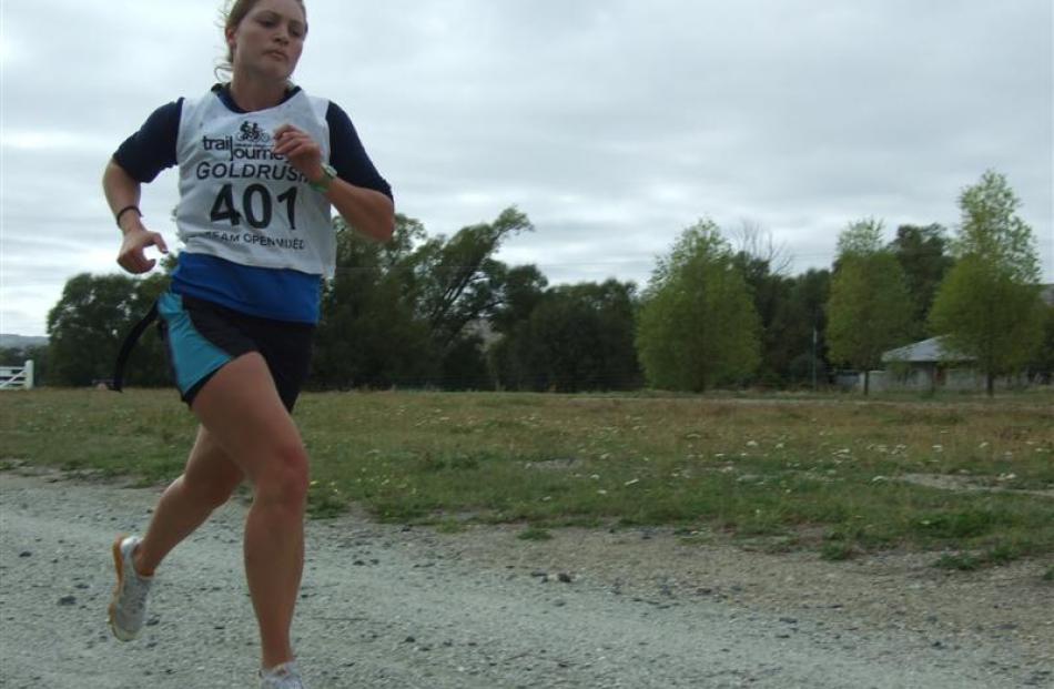 Team Fast's Danielle Lippit completes the 15km run section on Day Two in the open mixed team...