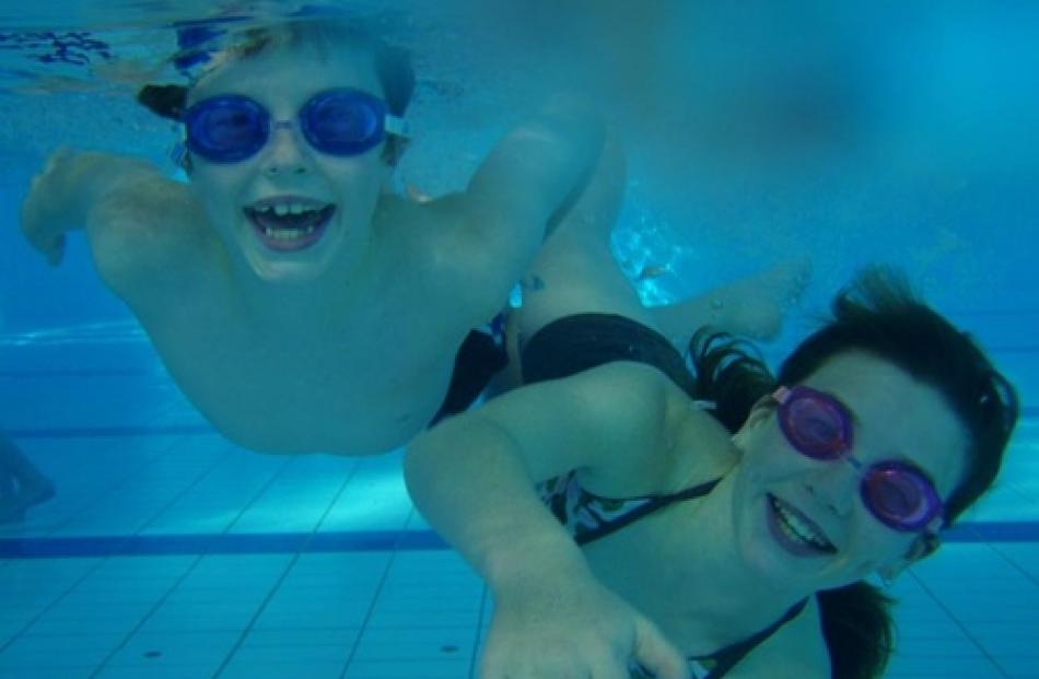 Jack (8) and Shanna Verhoef (11) enjoy a swim at Moana Pool in Dunedin. Photo by Kathy Richards.