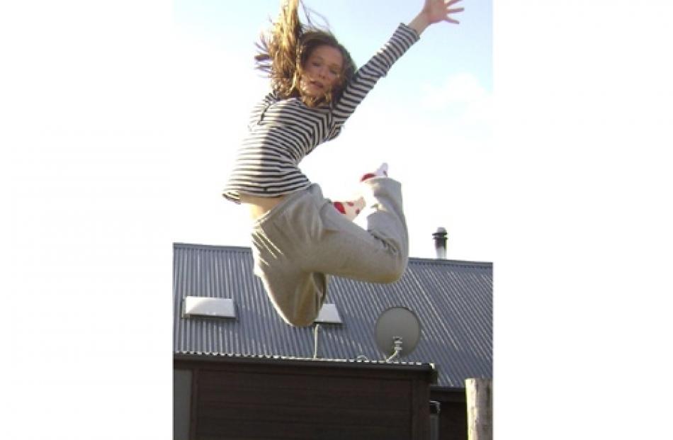 Sarah Lees (13) bounces high on the family’s trampoline in Albert Town, Wanaka. Photo by Amy Lees.