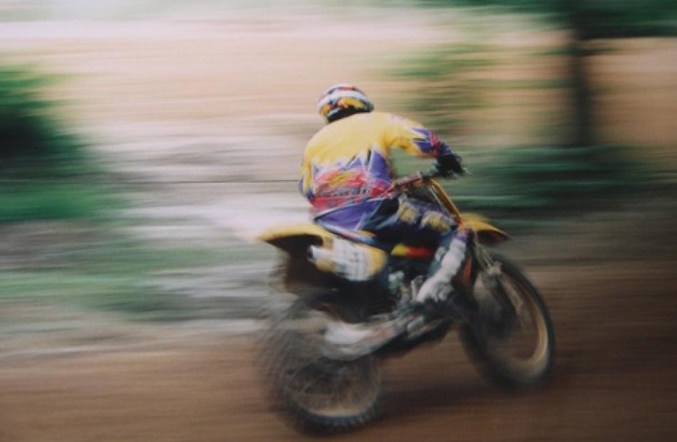 Mark Downey speeds by during the Southern Series motorcross event in Mosgiel. Photo by Jonelle...