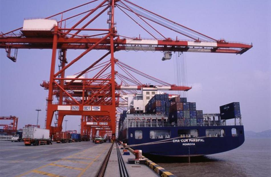 The world's biggest container ships dock at the Yangshan Deep Water Port.