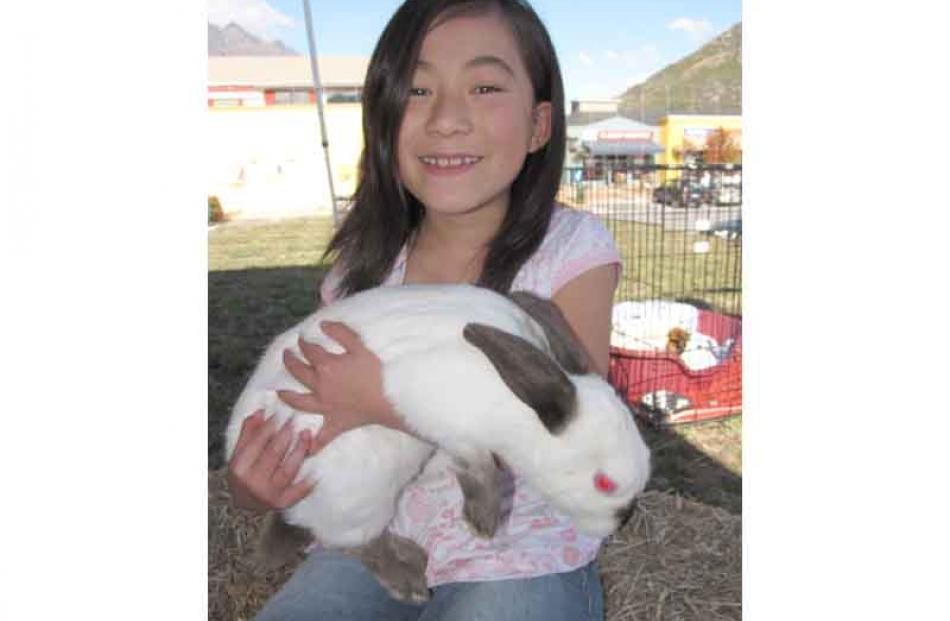 8-year-old Mio Akiyama, of Queenstown, with Frank, the Easter bunny.