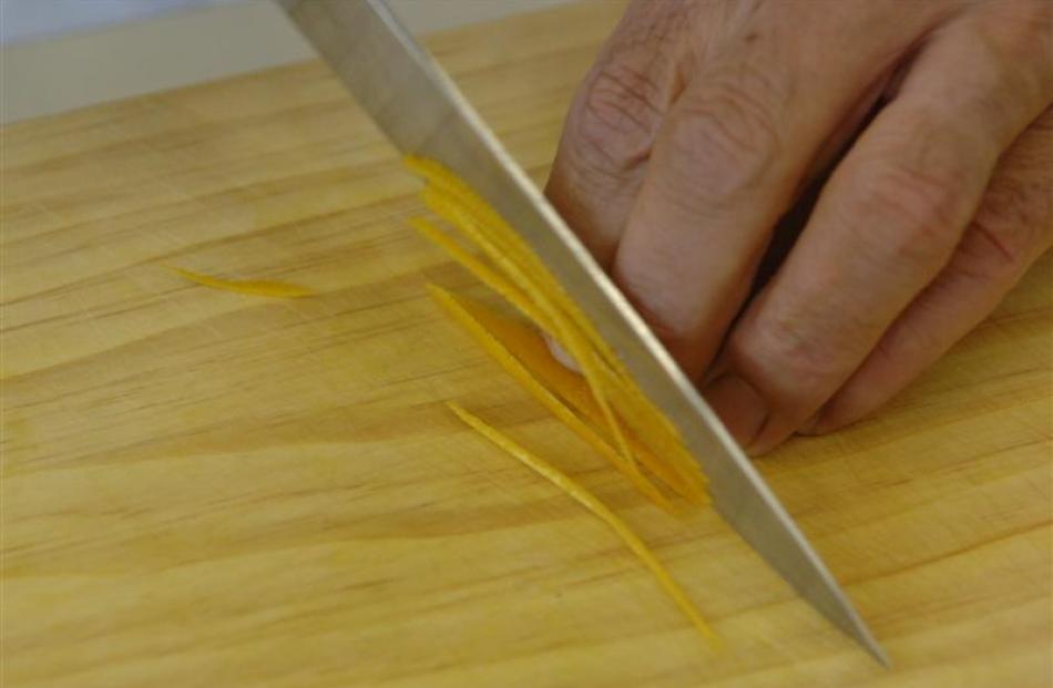 3. Cut peel into fine, julienne strips. They will be straight, rather than attractively curled as...