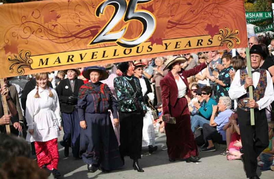 The 25th Arrowtown Autumn Festival Parade begins.