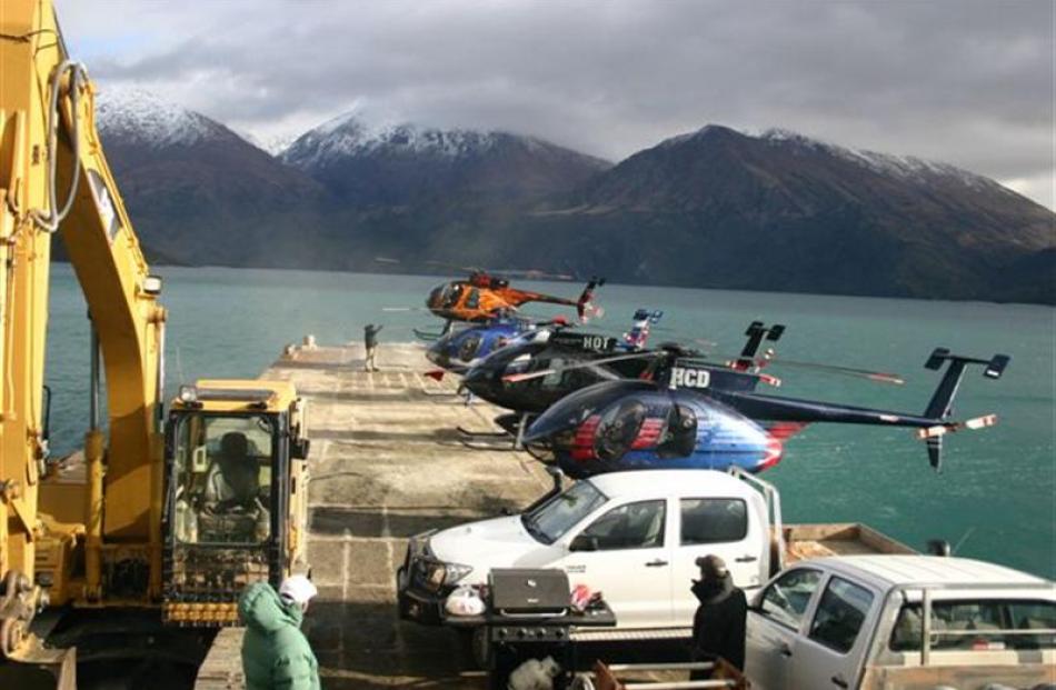 Vehicles of all descriptions line up on the Minaret station barge during the weekend attempt to...