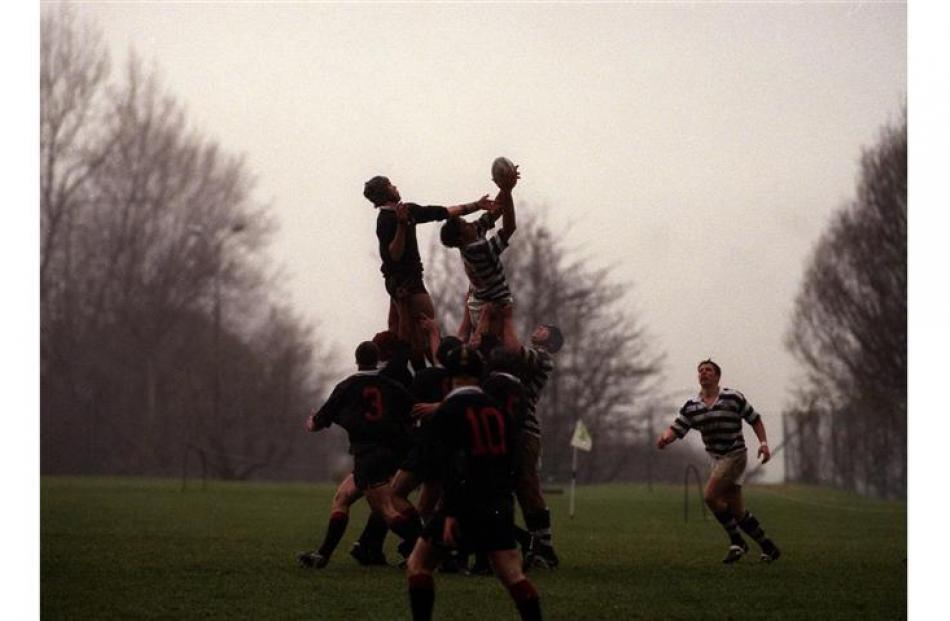 Otago Boys lock Justin Ellison is lifted by Wyatt Crockett and claims line-out ball from Waitaki...