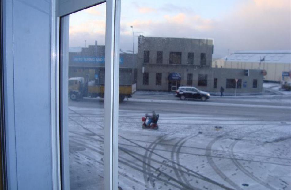 Billy Hamilton took this photo from the bus depot near the Oval where buses at 8.15am were not...