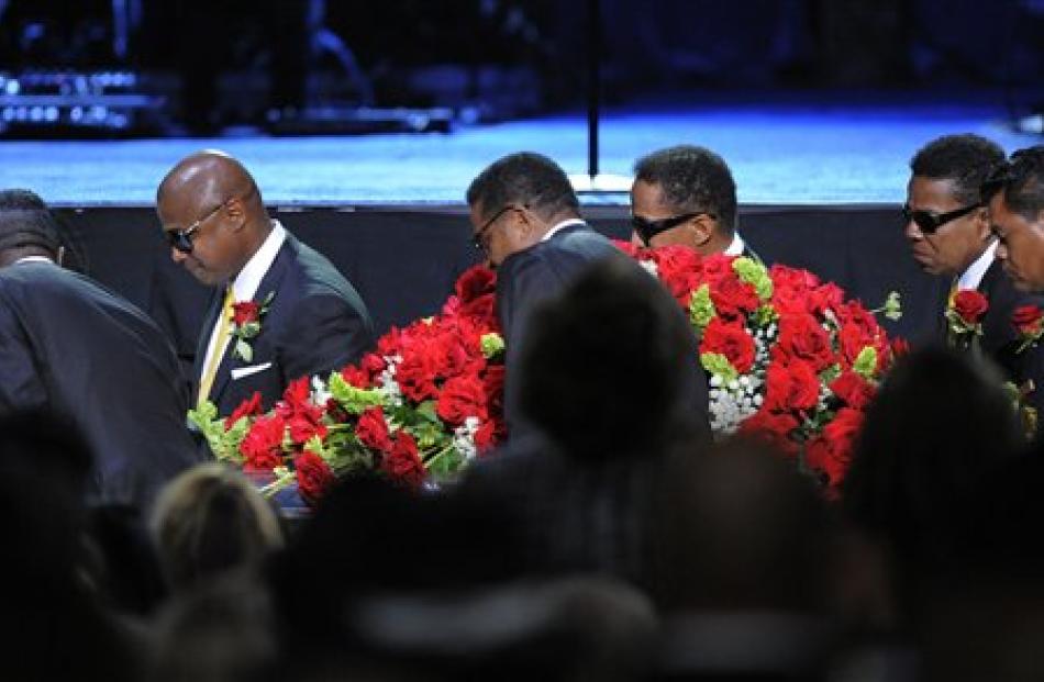 The Jackson brothers carry Micahel Jackson's casket out after the memorial service.