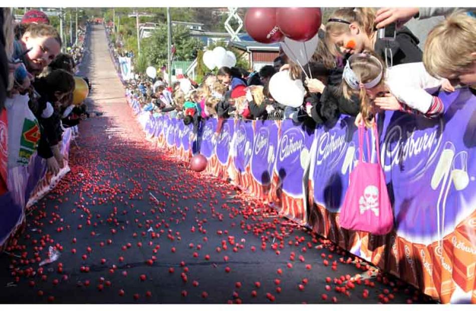 People cheer on the jaffas as they race.