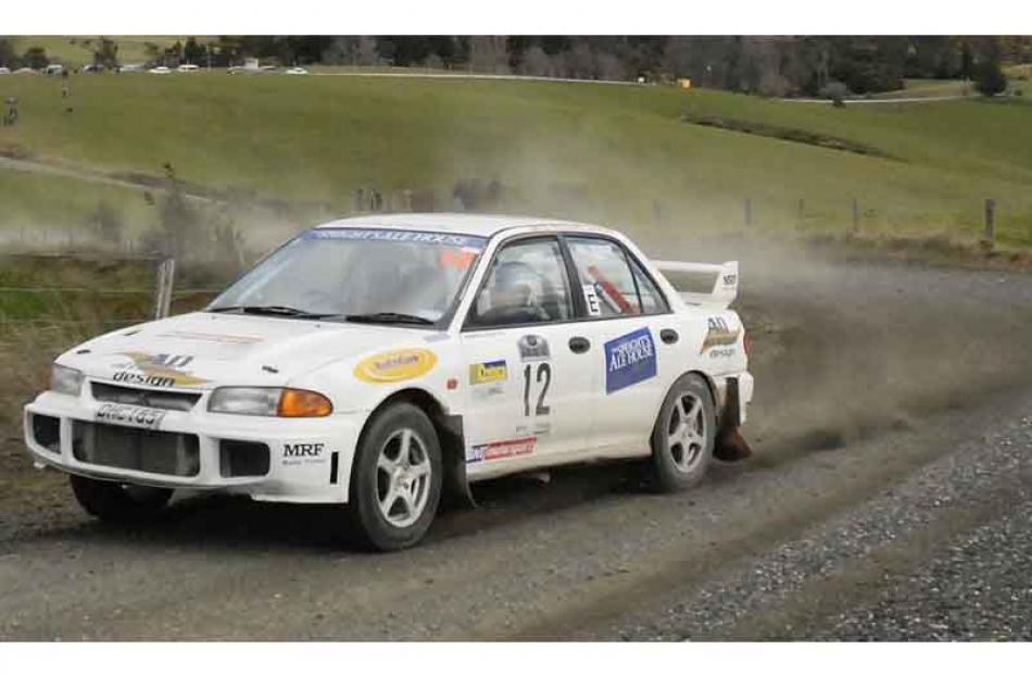 Driver Paul Dickson and Co-driver Andrew Beattie of Timaru in their Mitsubishi EVO 3 on Special...