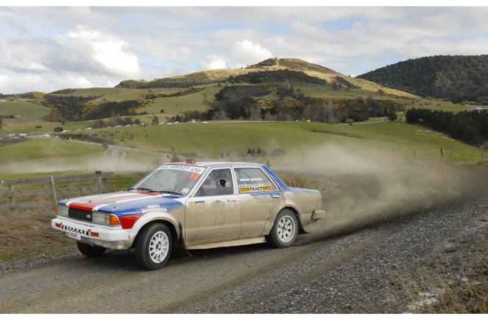 Driver Duncan McCrostie  and Co-driver Murray Marshall of Kaitangita in their Nissan Bluebird...