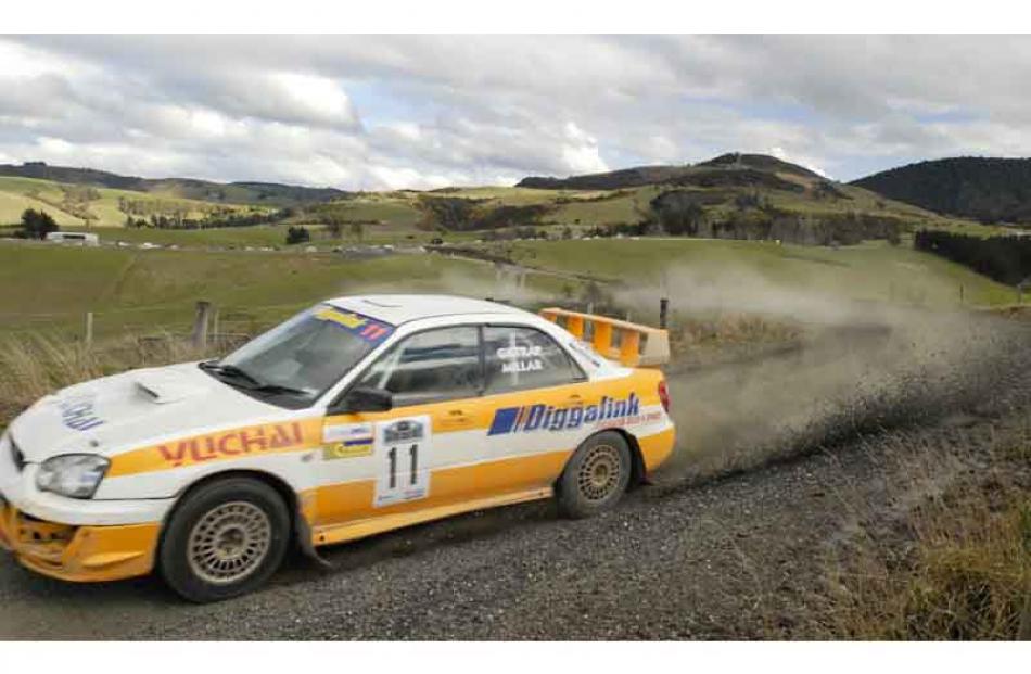 Driver John Glitrap and Co-driver Paul Millar of Canterbury in their Subaru Impreza WRX on...
