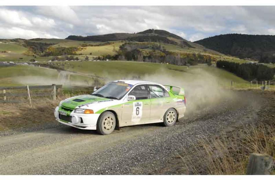 Driver Paul Cross and Co-driver Wade Horrell of Gore in their Mitsubishi EVO 4 on Special Stage 6...