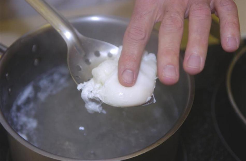 4. Rest the spoon on a teatowel or paper towel to drain.