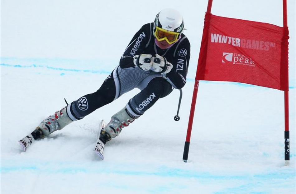 Britt Janyk (29), of Canada, speeds towards victory in the women's race. Photo from Getty Images.