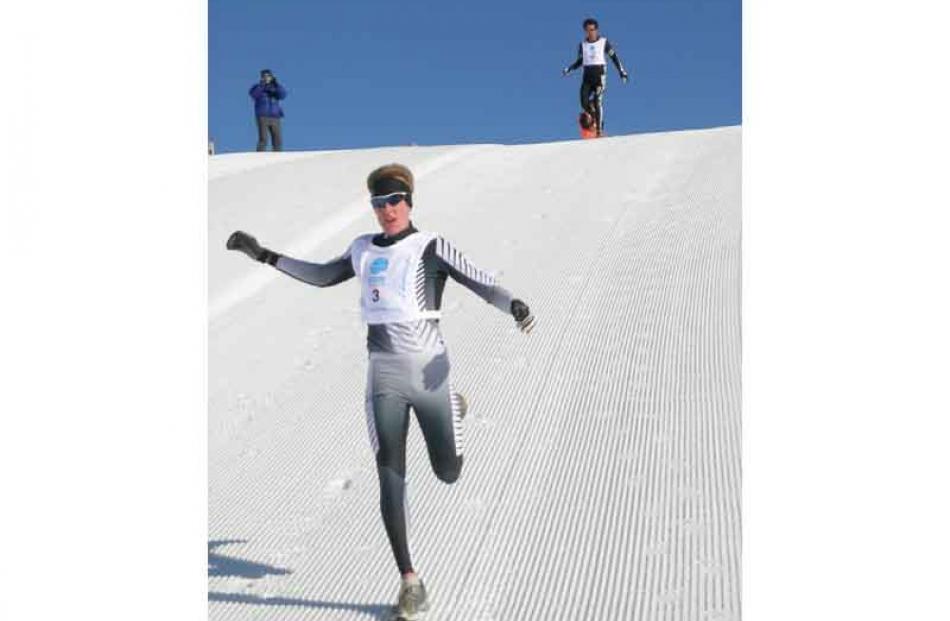 Andy Pohl of Dunedin is first down the hill in the Winter Games winter triathlon; In hot pursuit...
