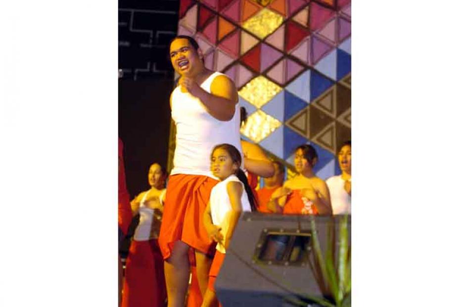 Teira Dean (17) and Taiarahi Dean (4) perform with the Kaikorai Valley College group at the Maori...