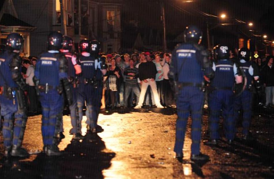 Police and students face off on Castle St. Photo by Craig Baxter