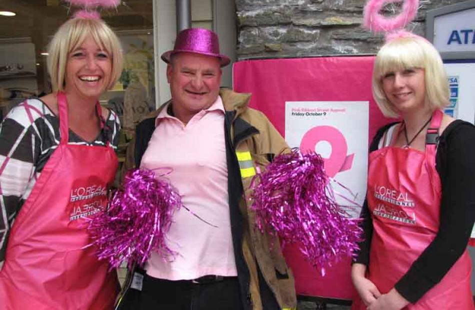D'Or Hair Stylists owner Rosemary Chalmers, left, with Arrowtown Volunteer Fire Brigade chief...