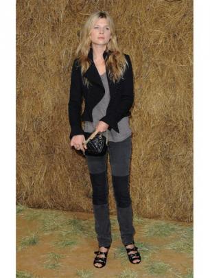 French actress and model Clemence Poesy arrives at the Chanel Pret a Porter last week in denims....