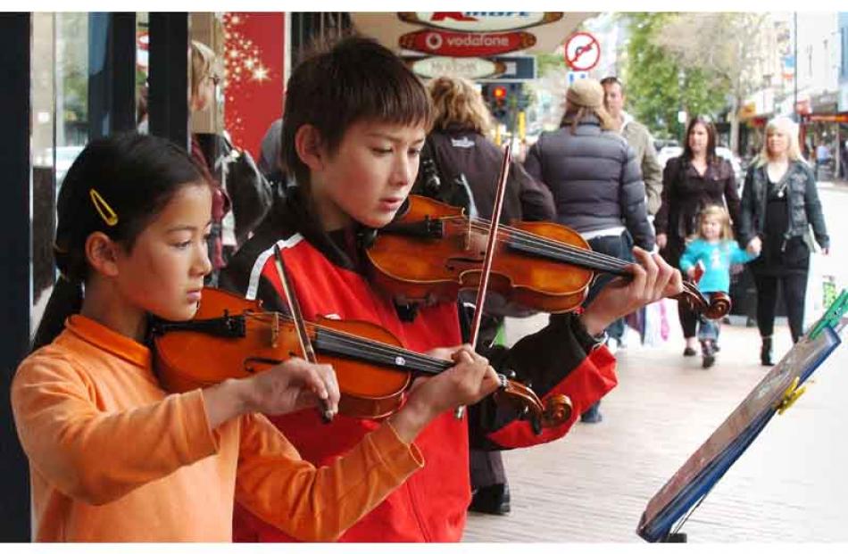 Sophelia (9) and Leon Hook (11) raise money to get themselves to a violin summer school in Oamaru...