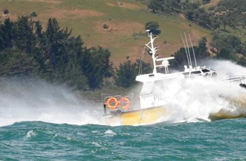 Port Otago's pilot boat Aramoana heads into severe weather off Aramoana yesterday.