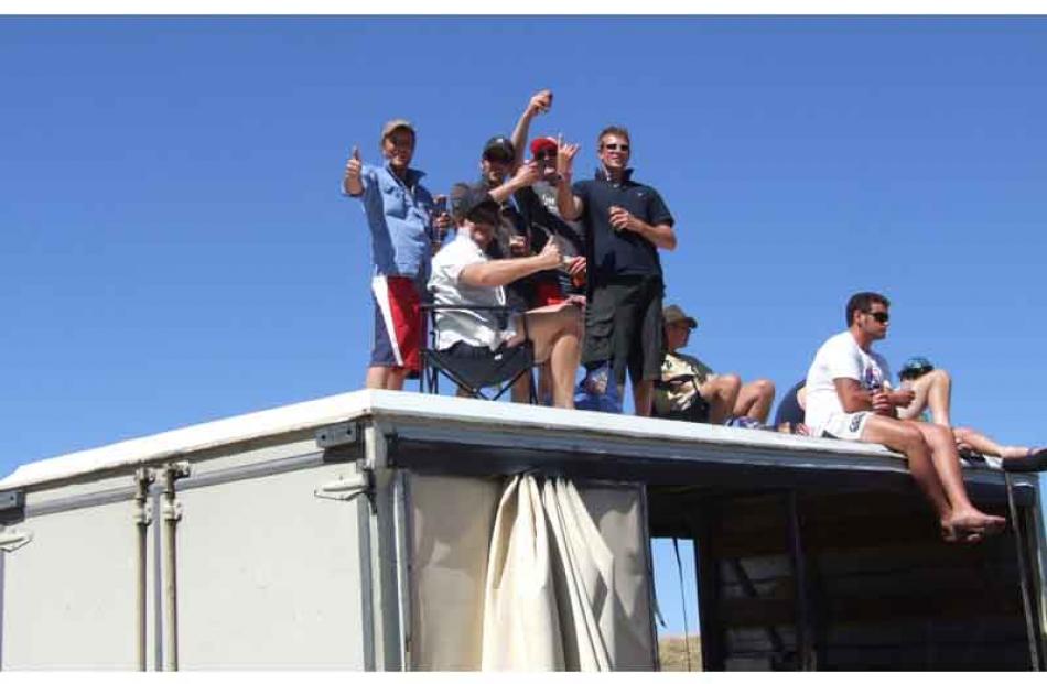 Enjoying their vantage point at the Wanaka Rode, are, from left, Tony Brady, Jason Grieves, Bob...