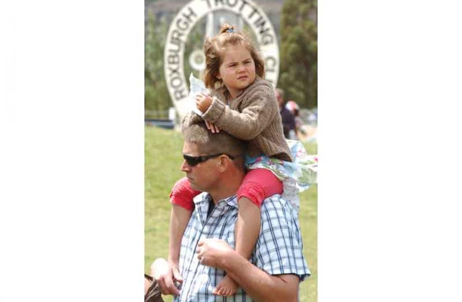 Emily Springfield (3) and father Duncan of Invercargill at the Roxburgh Trotting Club's meeting.