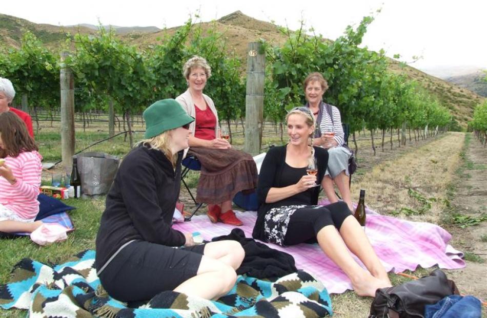 Enjoying the music are (from left) Fiona Arthur, of Auckland; her mother, Pauline Copeland, of...