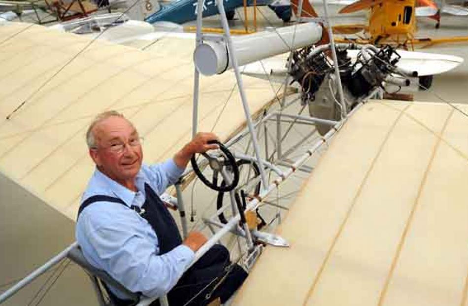 Croyden Aircraft Company owner Colin Smith, of Mandeville, in a replica Pither 1910 monoplane,...