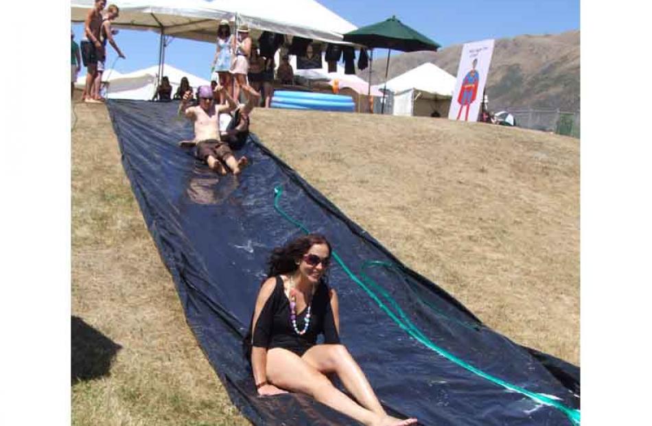 Kimberley Wills, of Nelson, cools off on the water slide.