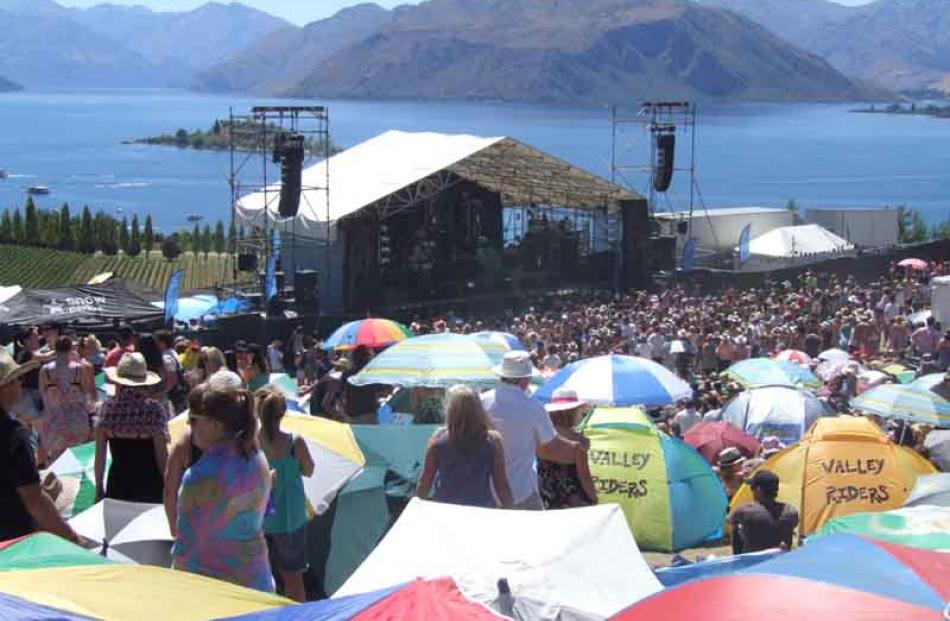 Sun umbrellas provid colour and shade for the sell-out crowd.