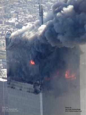 Smoke billowing from one of the towers of the World Trade Centre in New York. (AP Photo/NYPD via...