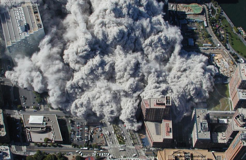 Smoke and ash engulf lower Manhattan after terrorists flew two airliners into the World Trade...