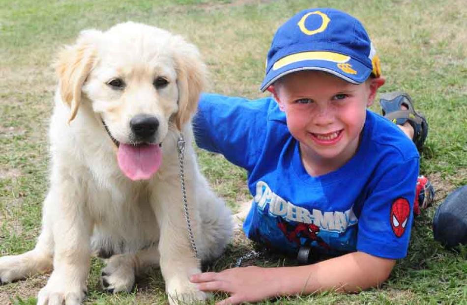 Winner of the pet parade Will Pringle (5) of Ranfurly and puppy Muddy Paws.