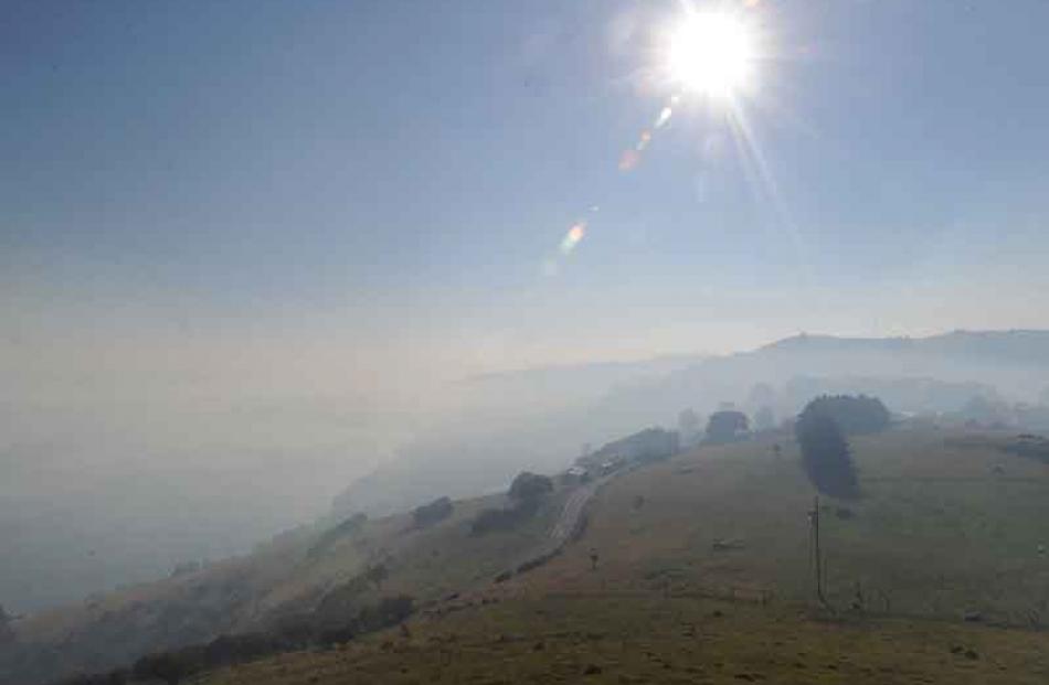 The sun dulled by smoke over the Otago Peninsula. Photo by Peter McIntosh.